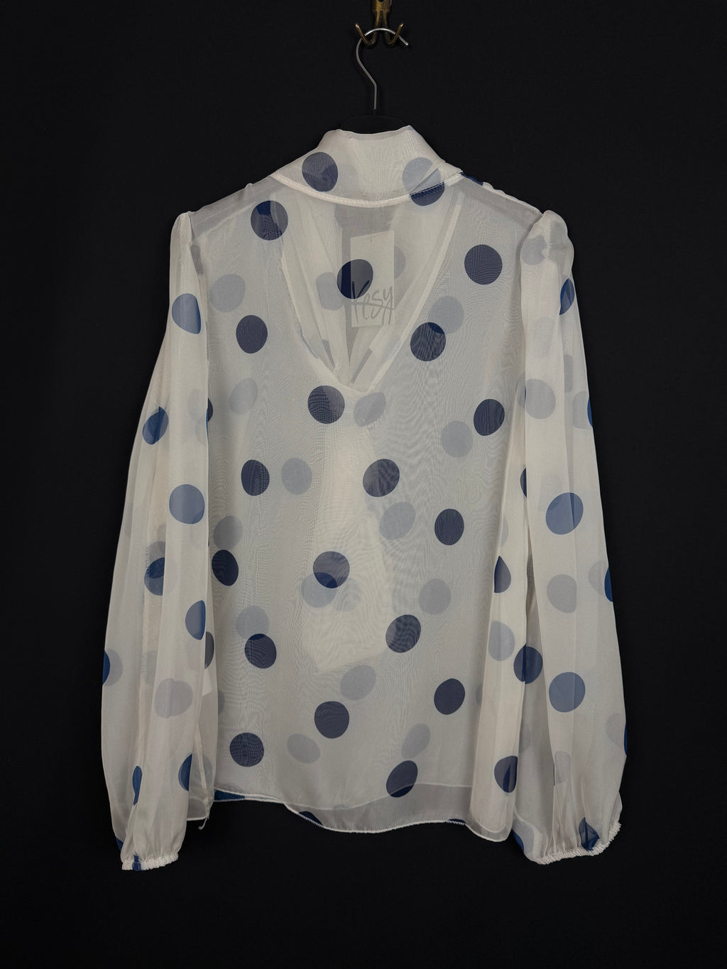 Camicetta stropicciata pois