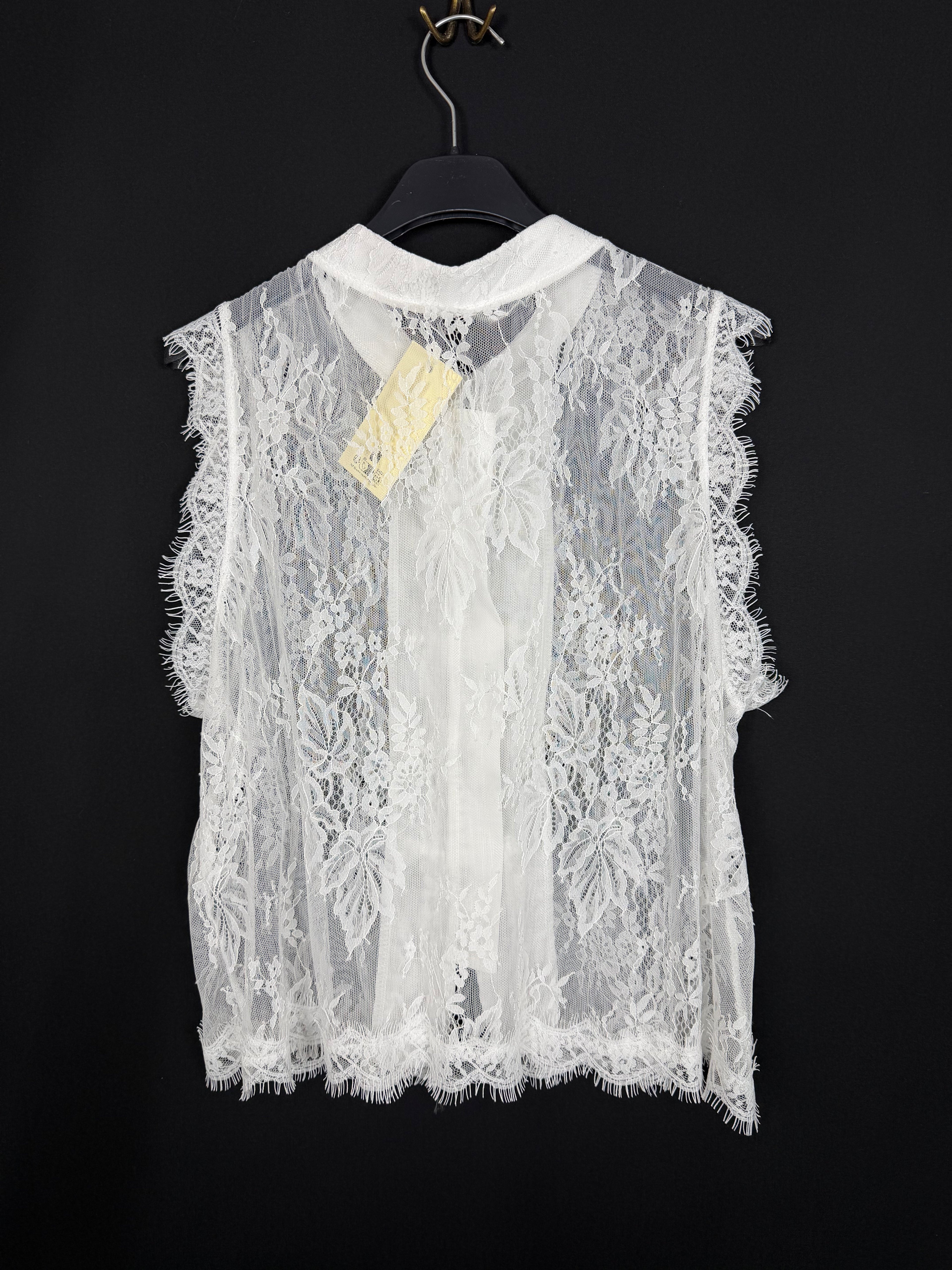 camicetta chic floreale smanicata
